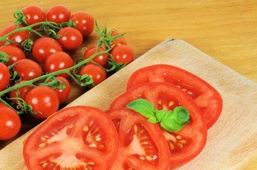 Group of traditional Italian tomatoes pachino on wooden background.