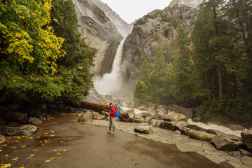 A father with baby son visit Yosemite National Park in Californai, USA
