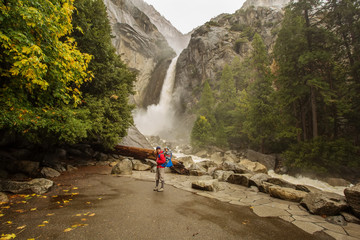 Fototapeta na wymiar A father with baby son visit Yosemite National Park in Californai, USA