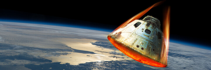 Reentry of space capsule into Earth's Atmosphere. - Elements of this image courtesy of NASA. - 196877089
