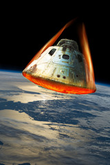 Reentry of space capsule into Earth's Atmosphere. - Elements of this image courtesy of NASA. - 196877099