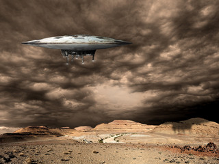 a large saucer shaped mothership hovers over a barren world. - Elements of this image furnished by...
