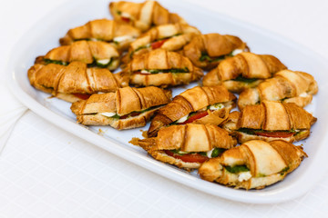 Sandwich croissant sandwich with ham cheese and vegetables
