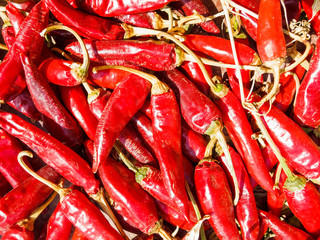 Background of closeup red hot peppers