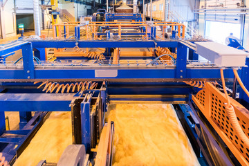 Glass production equipment at manufacture background