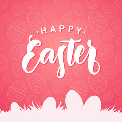 Greeting card with handwritten type lettering of Happy Easter and silhouette of eggs on grass on pink background.