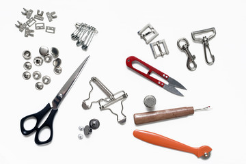 Belt buckles and rivets and metal sewing accessories