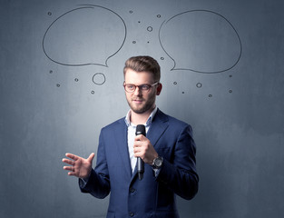 Businessman holding microphone