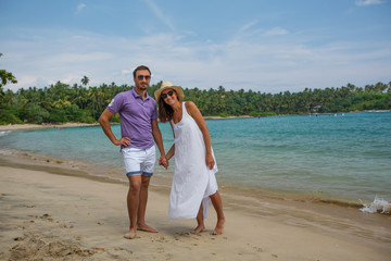 Couple on vacation at the seashore of Indian ocean