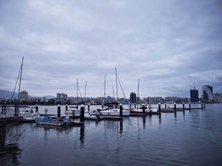 Fototapeta na wymiar Boats in the bay of Sokcho city. January 2017