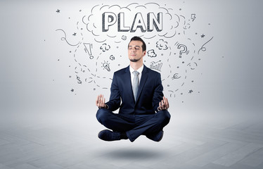 Businessman meditates with doodle concept