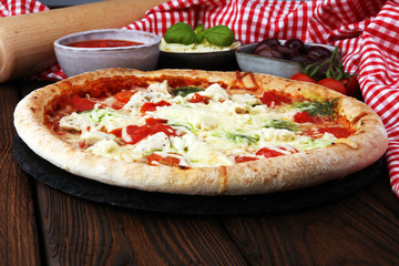 pizza with cheese fresh baked pizza coming out of the oven