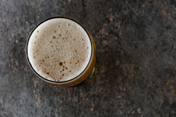 mug with beer on a vintage background