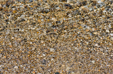 pebble stones into the clean water