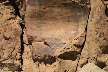 Rock wall with petroglyphs at Chaco Canyon in New Mexico