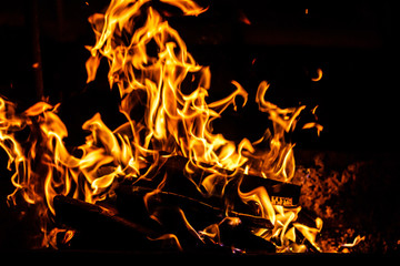 Fire flame on the black background fire in darkness