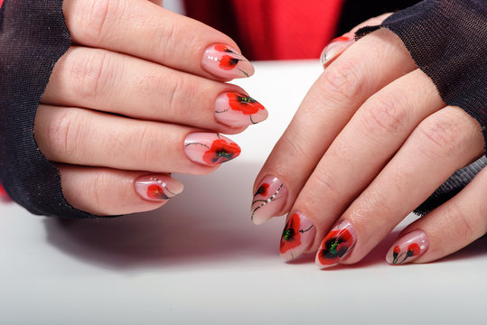 manicure with painted poppies on short square nails