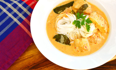 Rice noodles with fish and coconut curry sauce.(Thai name is Kanom Jeen Nam Ya Pla).