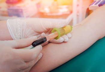 Nurse taking a blood sample. Medical equipment.