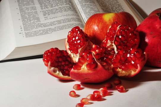 Rosh Hashanah (jewish Holiday) Concept - Apple And Pomegranate. Traditional Holiday Symbols. 