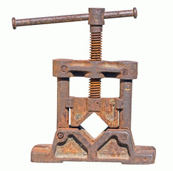 Old rusty table vises for handwork on metal and wood on white