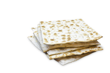 A photo of two pieces of matzah or matza isolated on white background. Matzah for the Jewish Passover holidays. Place for text, copy space. Selective soft focus.