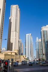 Fototapeta na wymiar Street and modern buildings in Dubai Marina, UAE