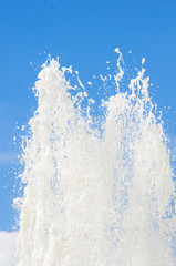 Fountain in city park on hot summer day