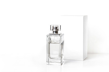 Perfume bottle, fragrance spray and white packaging box	