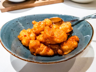 Tempura shrimps lie in a plate