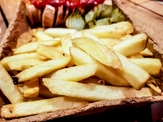 Fried French fries and sausage with ketchup lie to the box.
