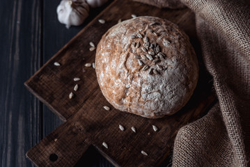 bread with seeds and garlic on the table