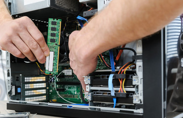 A man with a computer.