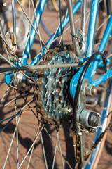 Close-up of the Cassette of Sprockets of a blue Racing Bike, View from the Side