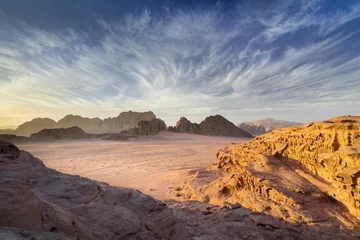 Foto auf Acrylglas Sunset time with beautiful light and sky in desert Wadi Rum in Jordan © sergejson