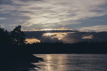 Sunset sky with rays of sun