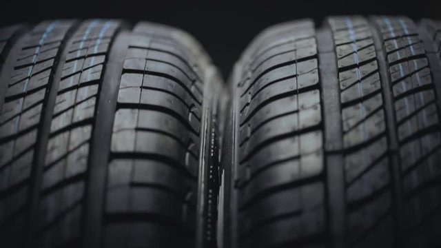 New and unused car tires spinning