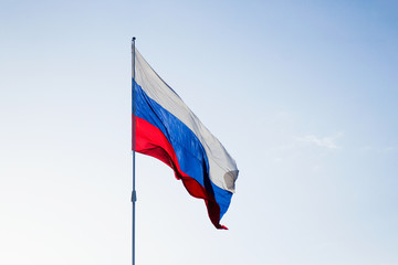 Flag of the Russian Federation in the blue sky. Calm