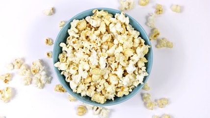 Popcorn in a bowl on white background
