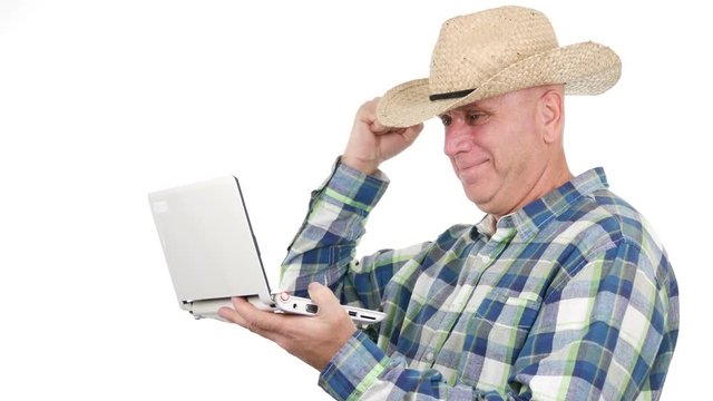 Farmer Using a Laptop Read Good News and Make Enthusiastic Hand Gestures