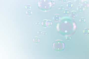Abstract beautiful color soap bubbles float in the air.