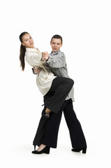 Two Topless girls posing on a white background.