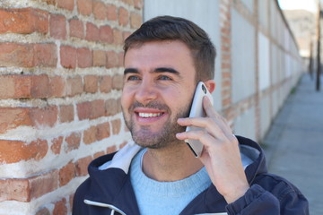 Cute guy calling on the street