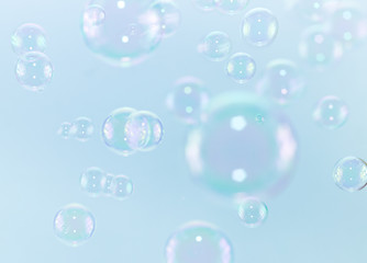 Beautiful freshness soap bubbles float in the air.