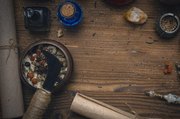 Magic potion. Alternative herbal medicine. Shaman table with copy space. Druidism concept. Witch doctor desk background.