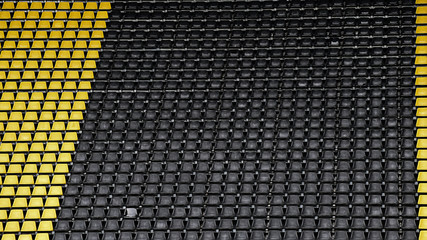 Obraz premium gelb schwarz Sitzreihen im Stadion
