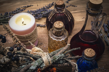 Magic potion. Alternative herbal medicine. Shaman table with copy space. Druidism concept. Witch...