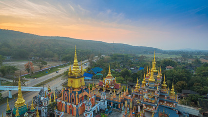 aerial photography sunrise at wat Huay Shrykhao hindu architecture in Chiang Rai Thailand