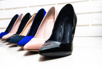High heels footwear on a white background. Fashion concept, catwalk. Online store, fashion store,...