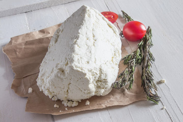 one whole sour milk piece of cottage cheese